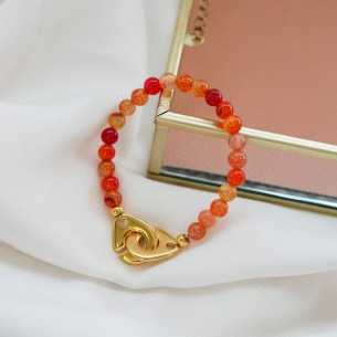 Bracelet menottes maxi dorées avec perles naturelles